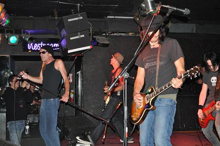 Michael onstage with the Redux band at Paladinos in August 2010