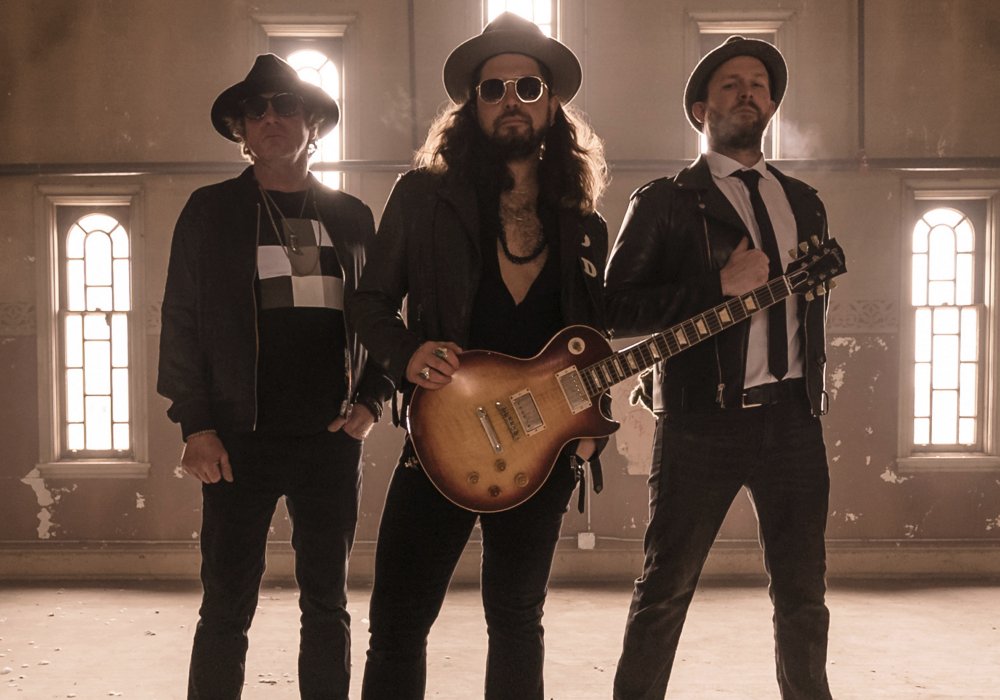  > Wilkes-Barre Pennsylvania’s blues-rock power trio, Dustin Douglas & > The Electric Gentlemen